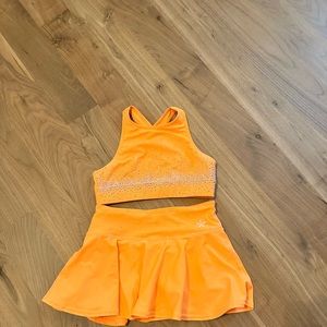 Rebel Athletic tangerine, rhinestone, sports bra, and skirt, youth large.